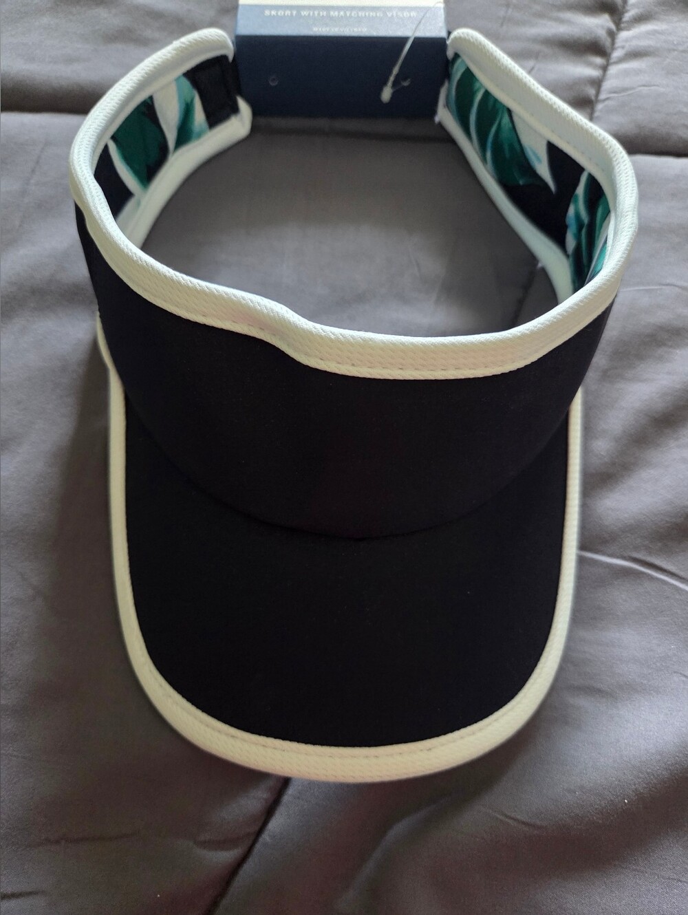 Tommy Bahama Navy Blue Visor with White Trim and Green Leaf Interior